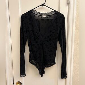 Free People bodysuit - sheer, black Velvet. Good condition. Size Small.